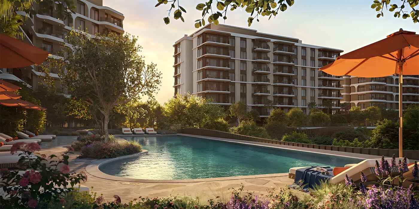 Resort-style swimming pool and residential buildings at The Canopies at Yas Point