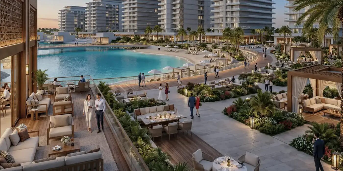 The Canopies at Yas Point waterfront promenade with pool, dining terraces and residential towers at dusk